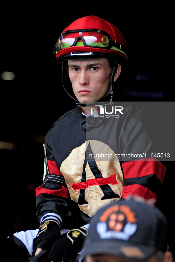 Jockey Fraser Aebly leaves the paddock ahead of the third race at Woodbine Racetrack in Toronto, Canada, on October 6, 2024. 