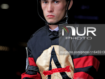 Jockey Fraser Aebly leaves the paddock ahead of the third race at Woodbine Racetrack in Toronto, Canada, on October 6, 2024. (