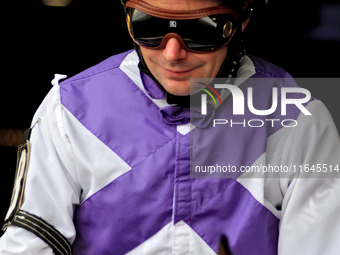 Jockey David Moran leaves the paddock ahead of the third race at Woodbine Racetrack in Toronto, Canada, on October 6, 2024. (