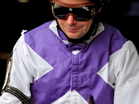 Jockey David Moran leaves the paddock ahead of the third race at Woodbine Racetrack in Toronto, Canada, on October 6, 2024. (