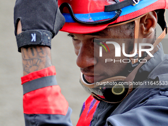 Jockey Da-Sean Gaskin exits the track following the sixth race at Woodbine Racetrack in Toronto, Canada, on October 6, 2024. (