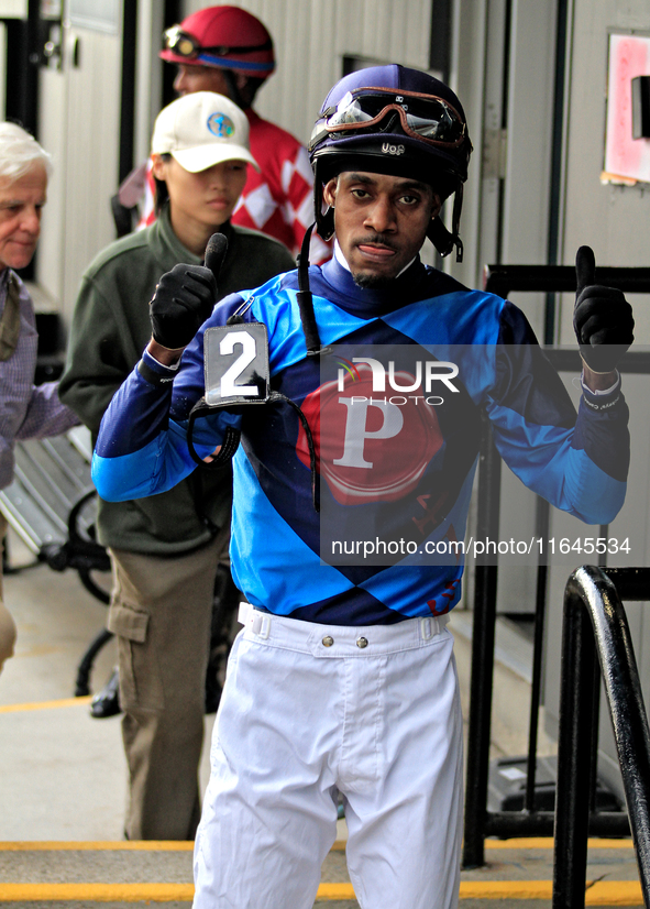 Jockey Keveh Nicholls gives the thumbs up after a win in the sixth race at Woodbine Racetrack in Toronto, Canada, on October 6, 2024. 