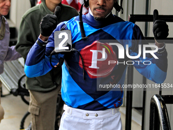 Jockey Keveh Nicholls gives the thumbs up after a win in the sixth race at Woodbine Racetrack in Toronto, Canada, on October 6, 2024. (