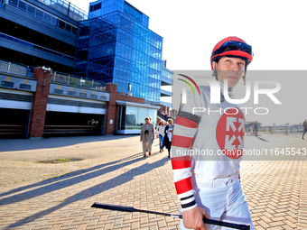 Jockey Emma-Jayne Wilson walks to the walking ring ahead of the 87th running of the $250,000 Cup & Saucer Stakes race at Woodbine Racetrack...