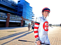 Jockey Emma-Jayne Wilson walks to the walking ring ahead of the 87th running of the $250,000 Cup & Saucer Stakes race at Woodbine Racetrack...