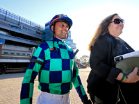 Jockey Patrick Husbands walks to the walking ring ahead of the 87th running of the $250,000 Cup & Saucer Stakes race at Woodbine Racetrack i...