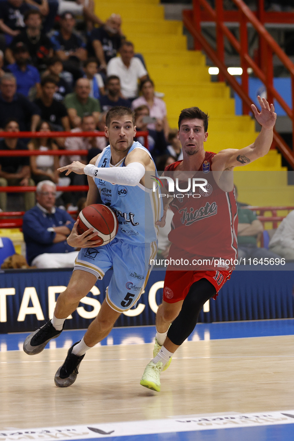 Giovanni De Nicolao of Napoli and Michele Ruzzier of Trieste are in action during the Italy Basket Serie A match between Napoli Basket and P...