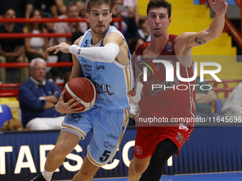 Giovanni De Nicolao of Napoli and Michele Ruzzier of Trieste are in action during the Italy Basket Serie A match between Napoli Basket and P...