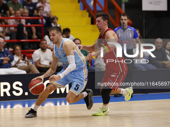 Giovanni De Nicolao of Napoli and Michele Ruzzier of Trieste are in action during the Italy Basket Serie A match between Napoli Basket and P...