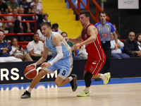 Giovanni De Nicolao of Napoli and Michele Ruzzier of Trieste are in action during the Italy Basket Serie A match between Napoli Basket and P...