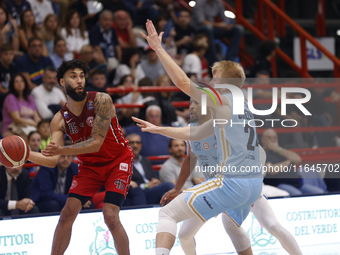 Denzel Valentine of Trieste and Dario Dreznjak of Napoli are in action during the Italy Basket Serie A match between Napoli Basket and Palla...