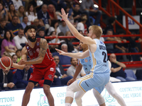 Denzel Valentine of Trieste and Dario Dreznjak of Napoli are in action during the Italy Basket Serie A match between Napoli Basket and Palla...