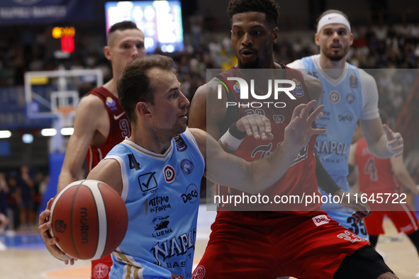 Napoli's Kevin Pangos and Trieste's Jeff Brooks are in action during the Italy Basket Serie A match between Napoli Basket and Pallacanestro...