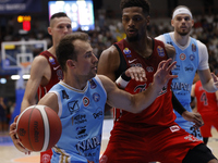 Napoli's Kevin Pangos and Trieste's Jeff Brooks are in action during the Italy Basket Serie A match between Napoli Basket and Pallacanestro...