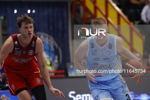 Jayce Johnson of Trieste and Kaspar Treier of Napoli are in action during the Italy Basket Serie A match between Napoli Basket and Pallacane...