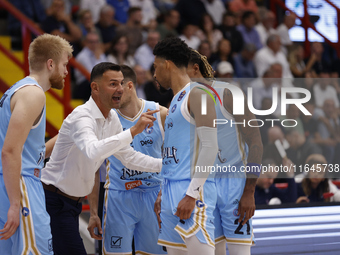 Igor Milicic, coach of Napoli, and Napoli's Zach Copeland are in action during the Italy Basket Serie A match between Napoli Basket and Pall...