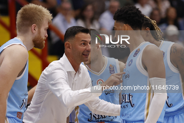 Igor Milicic, coach of Napoli, and Napoli's Zach Copeland are in action during the Italy Basket Serie A match between Napoli Basket and Pall...