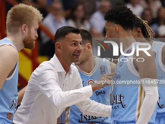 Igor Milicic, coach of Napoli, and Napoli's Zach Copeland are in action during the Italy Basket Serie A match between Napoli Basket and Pall...