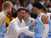 Igor Milicic, coach of Napoli, and Napoli's Zach Copeland are in action during the Italy Basket Serie A match between Napoli Basket and Pall...