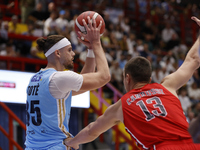 Napoli's Leonardo Tote and Trieste's Francesco Candussi are in action during the Italy Basket Serie A match between Napoli Basket and Pallac...