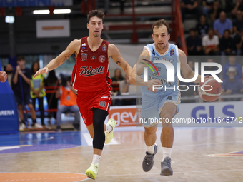 Kevin Pangos of Napoli and Michele Ruzzier of Trieste are in action during the Italy Basket Serie A match between Napoli Basket and Pallacan...