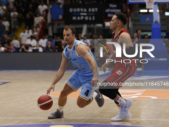 Napoli's Kevin Pangos and Trieste's Colbey Ross are in action during the Italy Basket Serie A match between Napoli Basket and Pallacanestro...