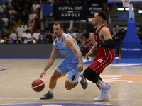 Napoli's Kevin Pangos and Trieste's Colbey Ross are in action during the Italy Basket Serie A match between Napoli Basket and Pallacanestro...