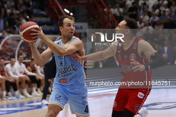 Napoli's Kevin Pangos and Trieste's Colbey Ross are in action during the Italy Basket Serie A match between Napoli Basket and Pallacanestro...