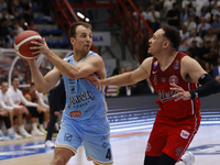 Napoli's Kevin Pangos and Trieste's Colbey Ross are in action during the Italy Basket Serie A match between Napoli Basket and Pallacanestro...