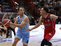 Napoli's Kevin Pangos and Trieste's Colbey Ross are in action during the Italy Basket Serie A match between Napoli Basket and Pallacanestro...