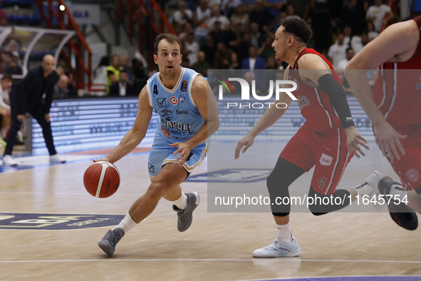 Napoli's Kevin Pangos and Trieste's Colbey Ross are in action during the Italy Basket Serie A match between Napoli Basket and Pallacanestro...