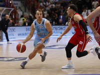 Napoli's Kevin Pangos and Trieste's Colbey Ross are in action during the Italy Basket Serie A match between Napoli Basket and Pallacanestro...