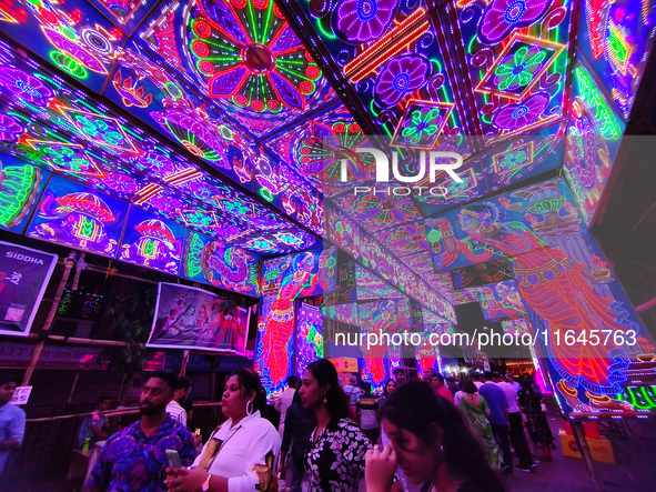 The light illuminates roads during the Durga Puja festival in Kolkata, India, on October 7, 2024. 