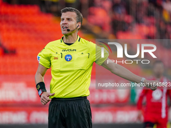 Federico La Penna (Referee) officiates the Italian championship Serie A football match between AC Monza and AS Roma at U-Power Stadium in Mo...