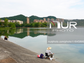 Housing for urban residents is seen in Yichang, Hubei province, China, on October 7, 2024. Today is World Habitat Day. (