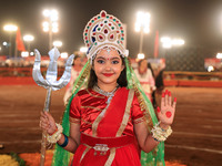 A participant performs 'Garba' during the Dainik Bhaskar Abhivyakti 'Garba Mahotsav' on the occasion of the Navratri festival in Jaipur, Raj...