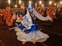 Participants perform 'Garba' during the Dainik Bhaskar Abhivyakti 'Garba Mahotsav' on the occasion of the Navratri festival in Jaipur, Rajas...