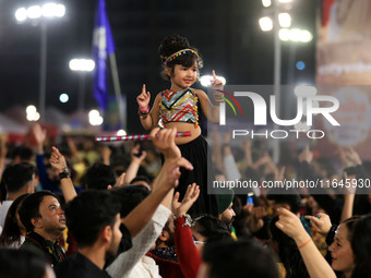 A little girl performs 'Garba' during the Dainik Bhaskar Abhivyakti 'Garba Mahotsav' on the occasion of the Navratri festival in Jaipur, Raj...