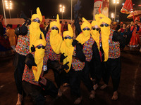 Participants perform 'Garba' during the Dainik Bhaskar Abhivyakti 'Garba Mahotsav' on the occasion of the Navratri festival in Jaipur, Rajas...