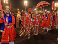 Participants perform 'Garba' during the Dainik Bhaskar Abhivyakti 'Garba Mahotsav' on the occasion of the Navratri festival in Jaipur, Rajas...