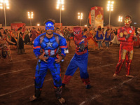 Participants perform 'Garba' during the Dainik Bhaskar Abhivyakti 'Garba Mahotsav' on the occasion of the Navratri festival in Jaipur, Rajas...