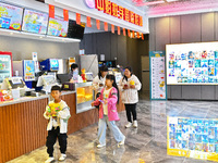 People buy snacks at the China Film Digital International Cinema in the Fushan district of Yantai, China, on October 7, 2024. (