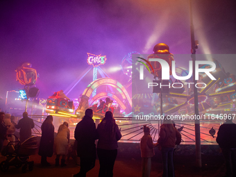 People attend the 751st edition of the Autumn Fair in Nijmegen city center, on October 5, 2024. (