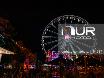 People attend the 751st edition of the Autumn Fair in Nijmegen city center, on October 5, 2024. (