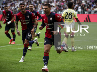 Cagliari midfielder Razvan Marin (18) celebrates after scoring his goal to make it 1-1 during the Serie A football match number 7, Juventus...