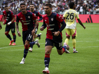 Cagliari midfielder Razvan Marin (18) celebrates after scoring his goal to make it 1-1 during the Serie A football match number 7, Juventus...