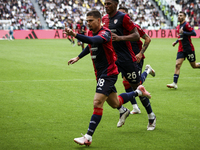 Cagliari midfielder Razvan Marin (18) celebrates after scoring his goal to make it 1-1 during the Serie A football match number 7, Juventus...