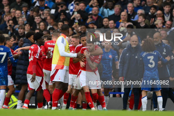 Murillo of Nottingham Forest forces Neco Williams of Nottingham Forest away from trouble during the Premier League match between Chelsea and...