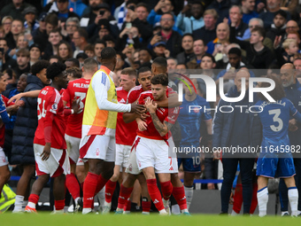 Murillo of Nottingham Forest forces Neco Williams of Nottingham Forest away from trouble during the Premier League match between Chelsea and...