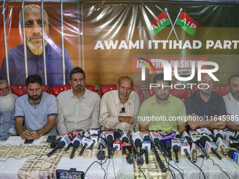 Member of Parliament Sheikh Abdul Rashid, also known as Engineer Rashid, (Center) speaks during a press conference in Srinagar, Jammu and Ka...